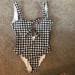 One piece black and white checkered bathing suit